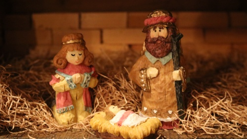 Baby in the manger carving.
