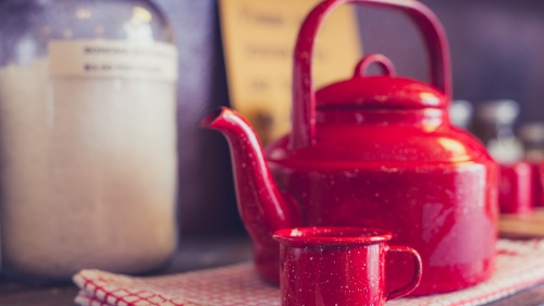 A tea pot and cup.