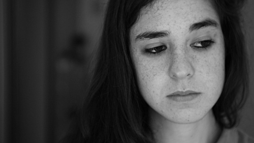 A closeup of young woman's face.