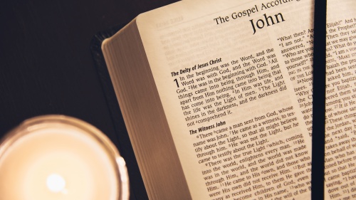 A Bible opened to the book John.