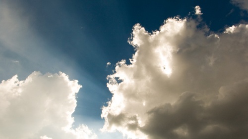 Sun rays coming through the clouds.