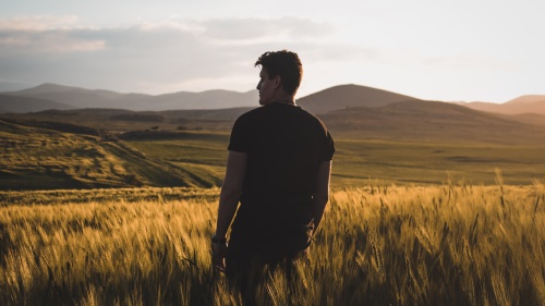 A man standing in a field.