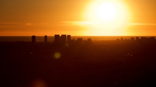 Sunrise over a city.