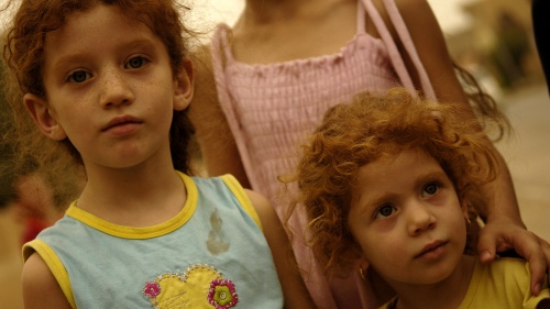 A young Iraqi girl and her sister in the Christian village of Qaraqosh, outside of Mosul, Iraq.