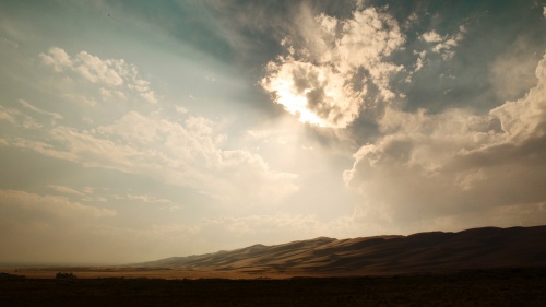 Sun rays coming through the clouds.