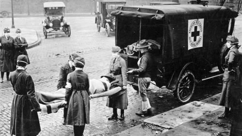 Nurses transport a Spanish flu victim in 1918.