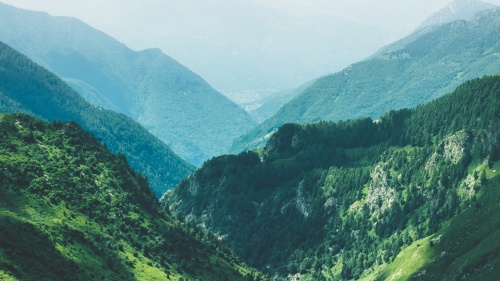 Photo of valley surrounded by mountains.