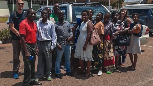 The author and his wife Megan, at left and right rear, share goodbyes at the airport in Malawi, Africa, before flying back to America.