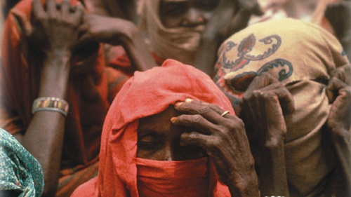 A group of frail looking people.