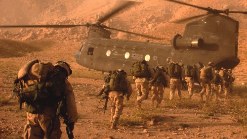 U.S. Army troops board a Chinook helicopter in the rugged mountains of Zabul province, Afghanistan, in the early years of the war.