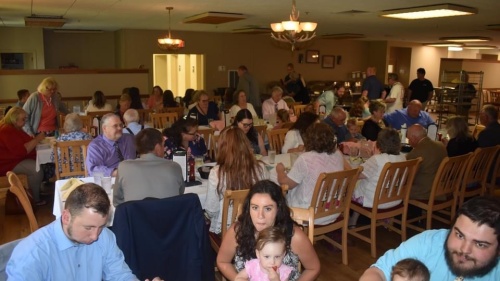 A group of brethren eating a meal