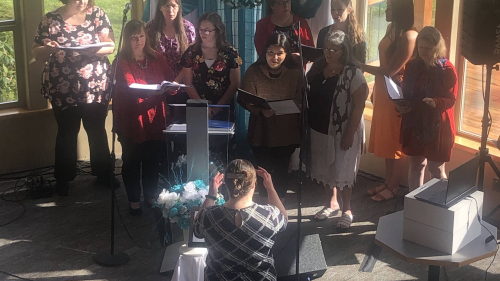 A group of women performing music