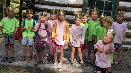 a group of children wearing crowns