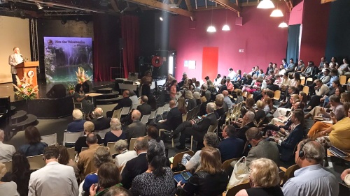 brethren seated in an auditorium for services