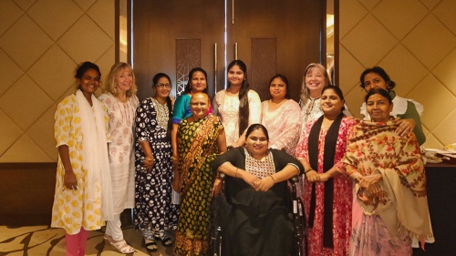 a group of women wearing traditional dresses