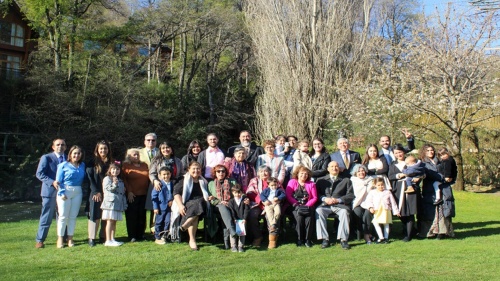 a large group of people standing outdoors