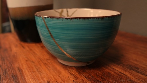 green-blue bowl with golden joinery