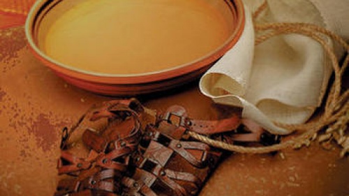 Water basin and pair of sandals.