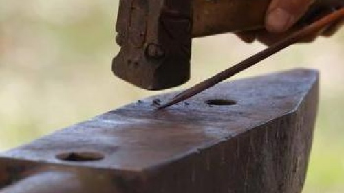 blacksmith anvil and tools