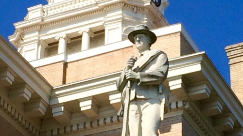 Confederate solider statue outside a courthouse.