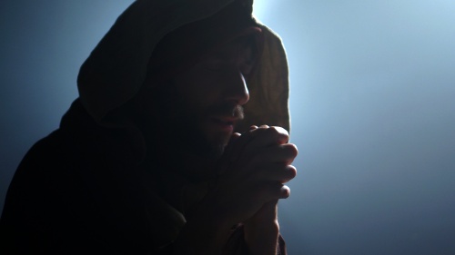 A photo illustrating Daniel praying.