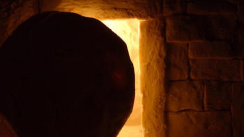 The inside of a tomb looking out.