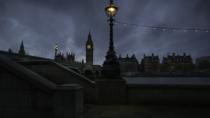 A night shot of London with Big Ben belltower in the distance.