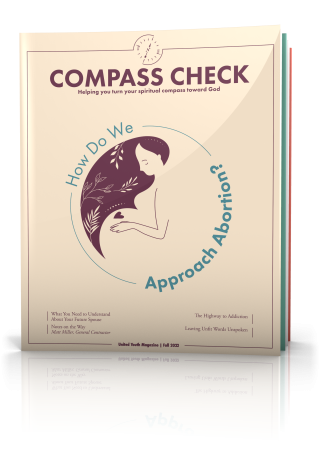 tilted cover of compass check magazine fall 2022