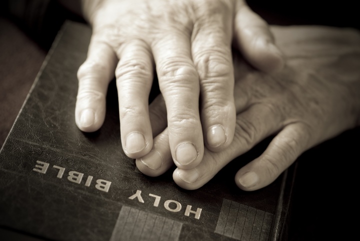 Hand on a Bible