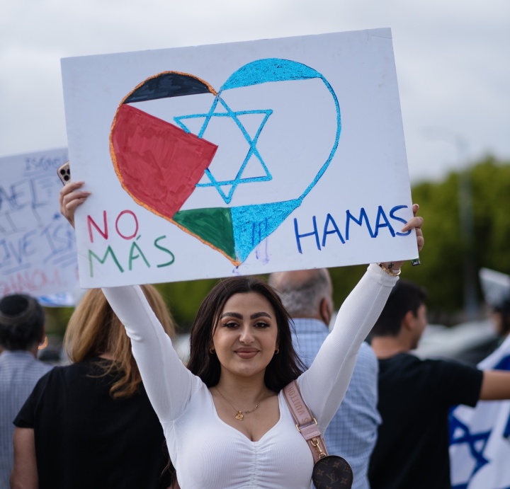 A woman holding up a No Hamas sign.