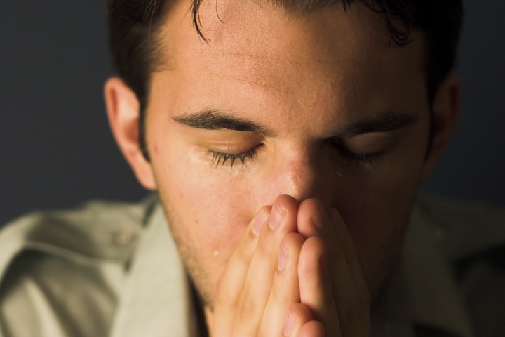 A man praying.