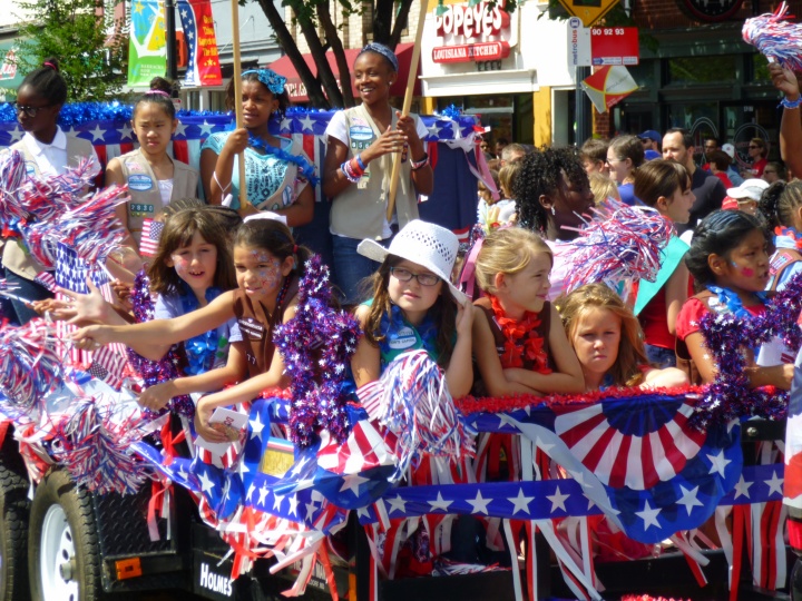 Girls on a parade float.