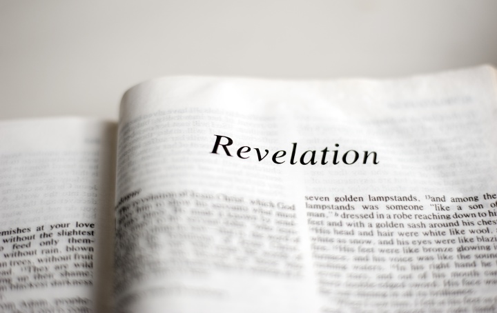 Bible open to the book of Revelation,