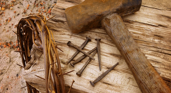 Crown of thorns, old nails and old hammer.