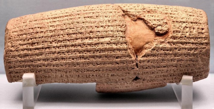 A cuneiform-covered cylinder.