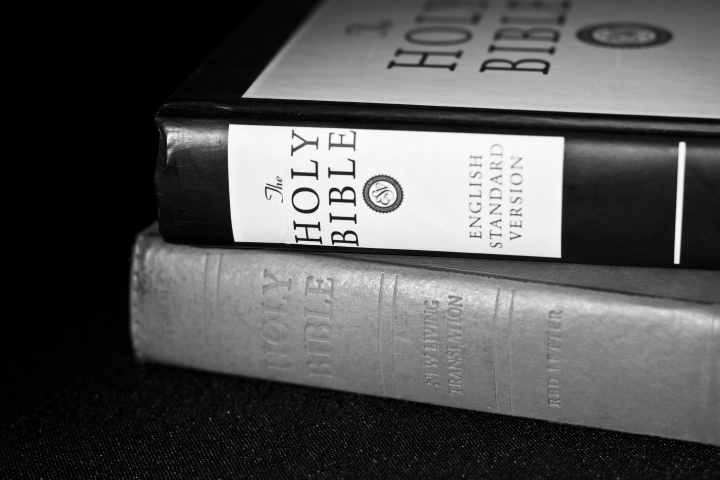 Bibles stacked on top of each other.