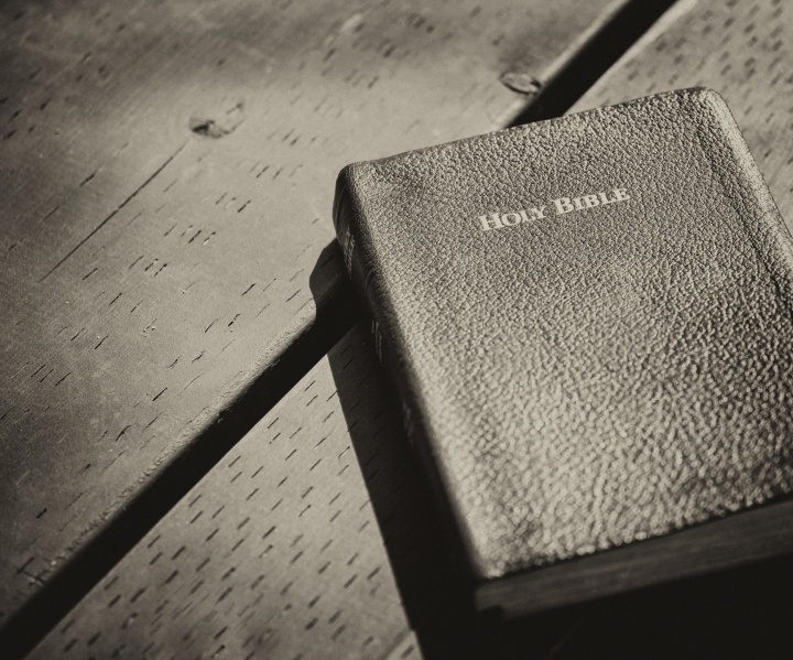 A Bible on a table.