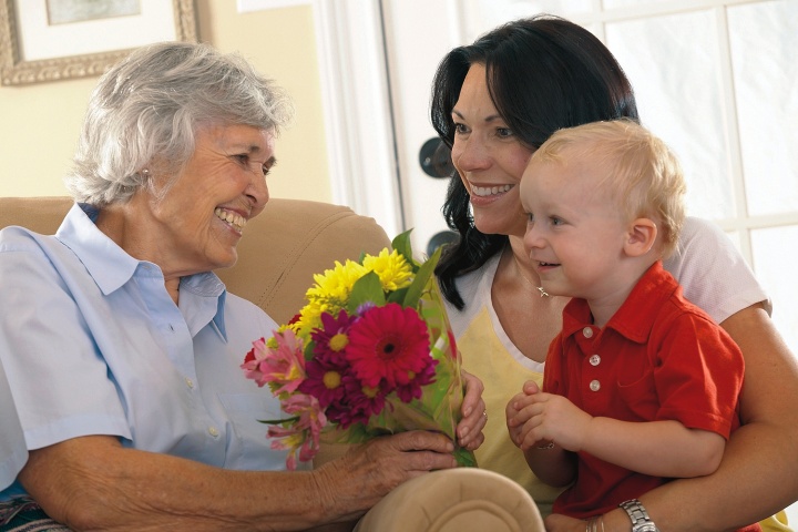 A grandma, mom and little boy.