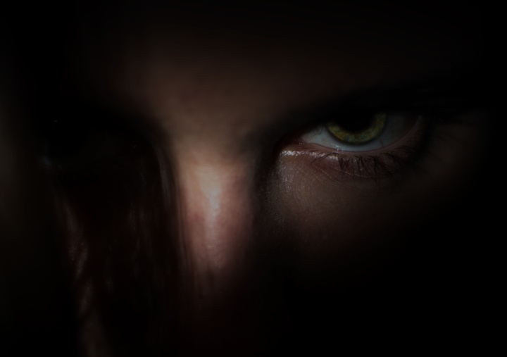 Upclose of angry eyes of a person.