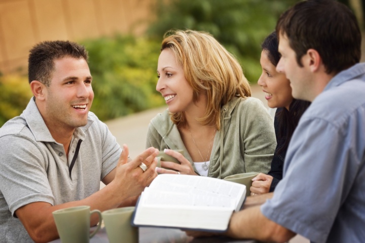 A group of people talking.