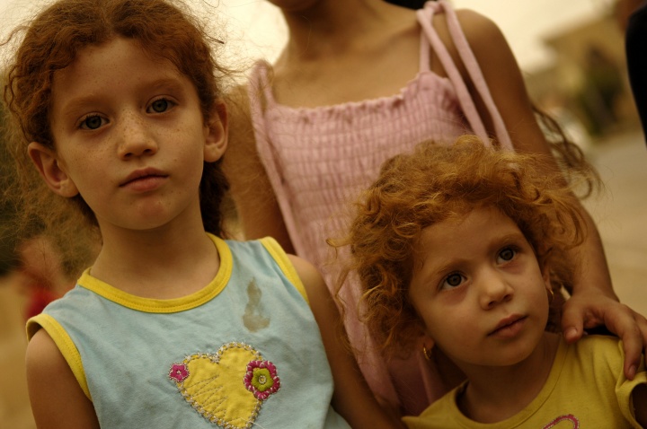 A young Iraqi girl and her sister in the Christian village of Qaraqosh, outside of Mosul, Iraq.