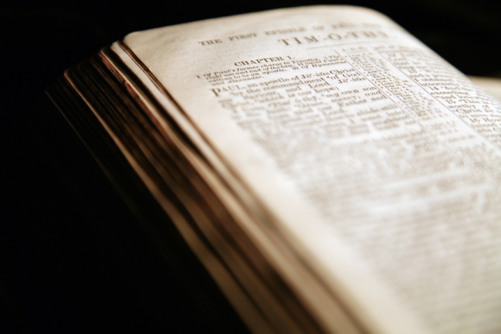 A Bible opened to the book of Timothy.