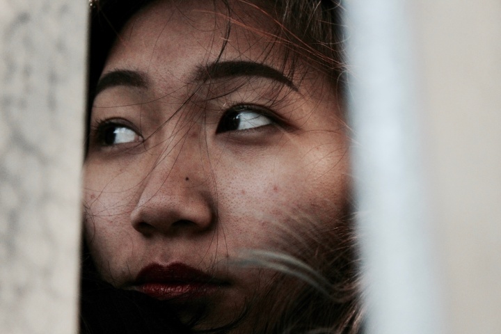 Upclose photo of a women's face.