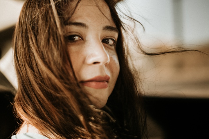 Up close photo of a woman's face.