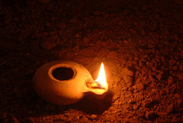 A clay oil lamp.