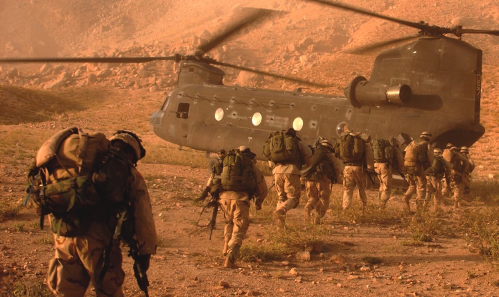 U.S. Army troops board a Chinook helicopter in the rugged mountains of Zabul province, Afghanistan, in the early years of the war.