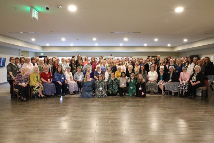 a group of ladies gathered for the enrichment weekend