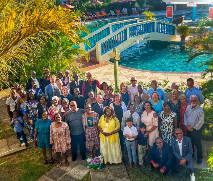 a group of people seen from above with a resort background