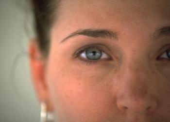 A close up of a woman's face.