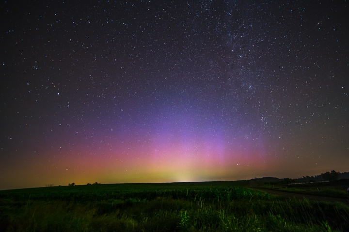 Stars in the night sky. Glowing horizon.